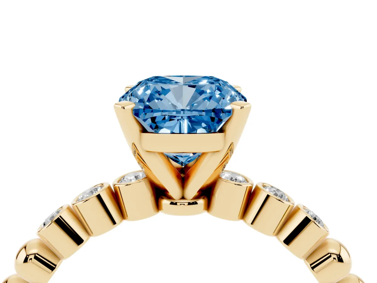 Fancy Blue Cushion Cut Solitaire Bezel Accent Diamond Engagement Ring with Beaded Band and Four-Prong Setting Yellow gold