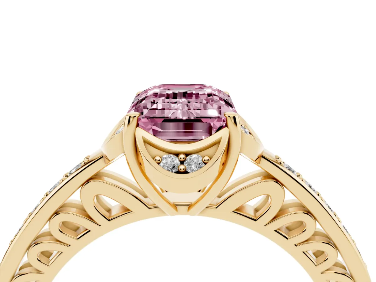 Fancy Pink Emerald Cut Cut Halo Diamond Ring with Channel Set Band and Four-Prong Setting Yellow gold
