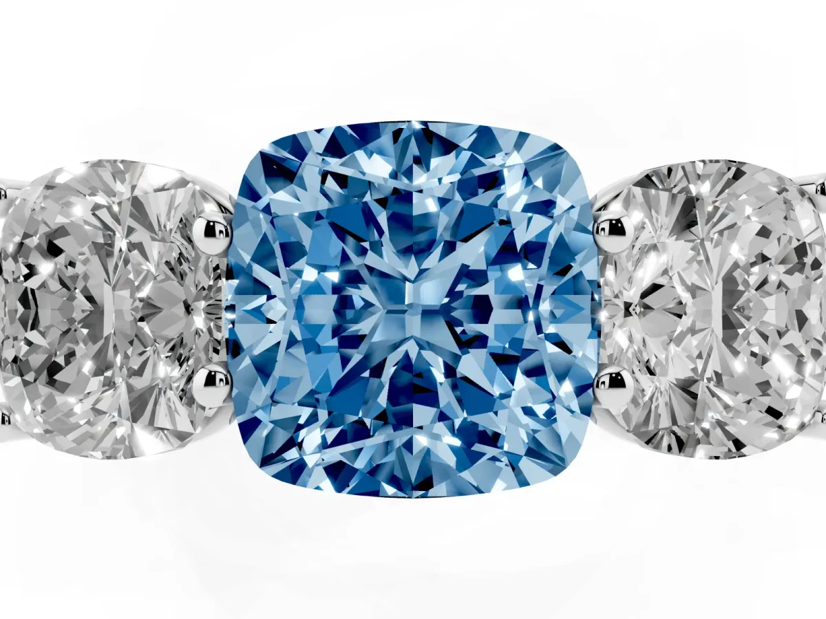 Fancy Blue Cushion Cut Three-Stone Diamond Ring with Prong Setting on a Classic Band Silver