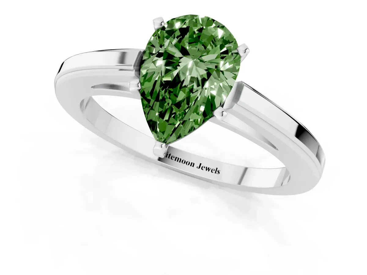 Fancy Green Pear Cut Solitaire Diamond Ring with Four-Prong Setting and Classic Band Silver