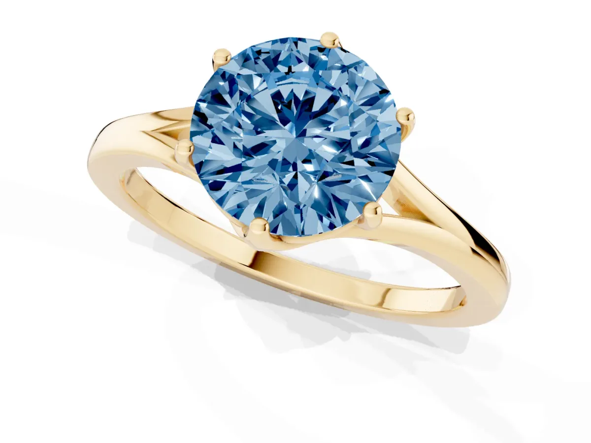 Fancy Blue Round Cut Solitaire Diamond Ring with Six-Prong Setting and Tapered Band Yellow gold