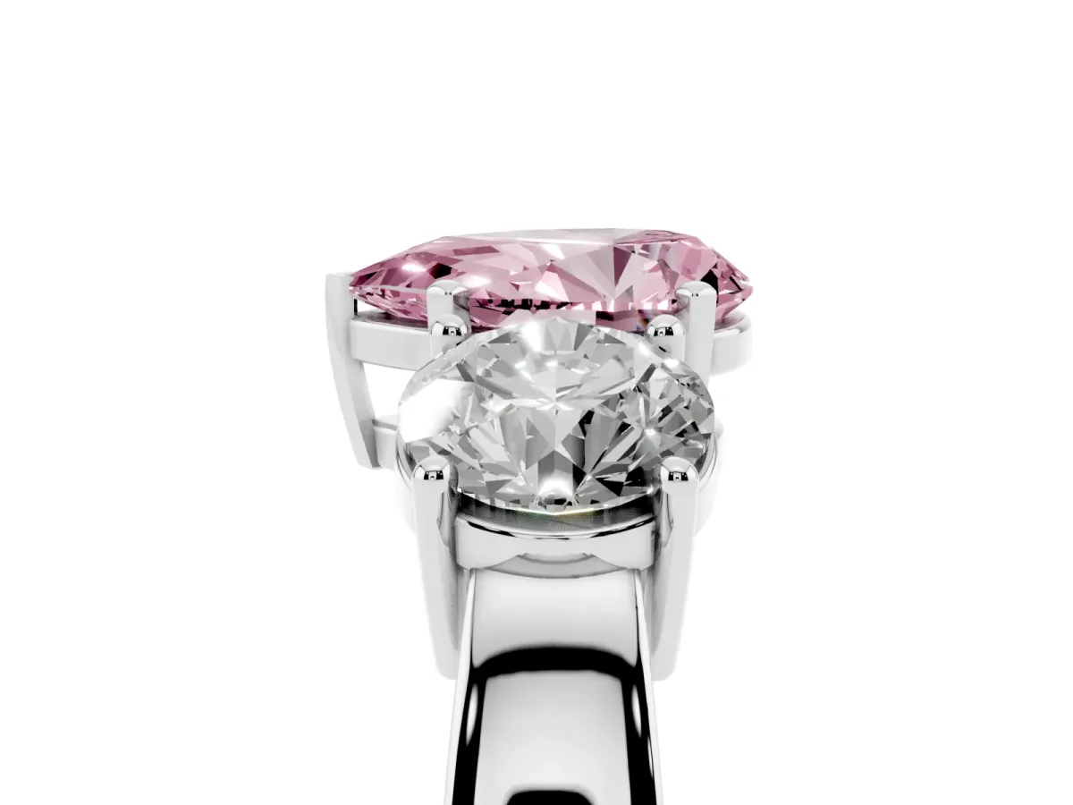 Fancy Pink Three-Stone Pear Cut Diamond Ring with Round Side Stones, Classic Band, and Four-Prong Setting Platinum