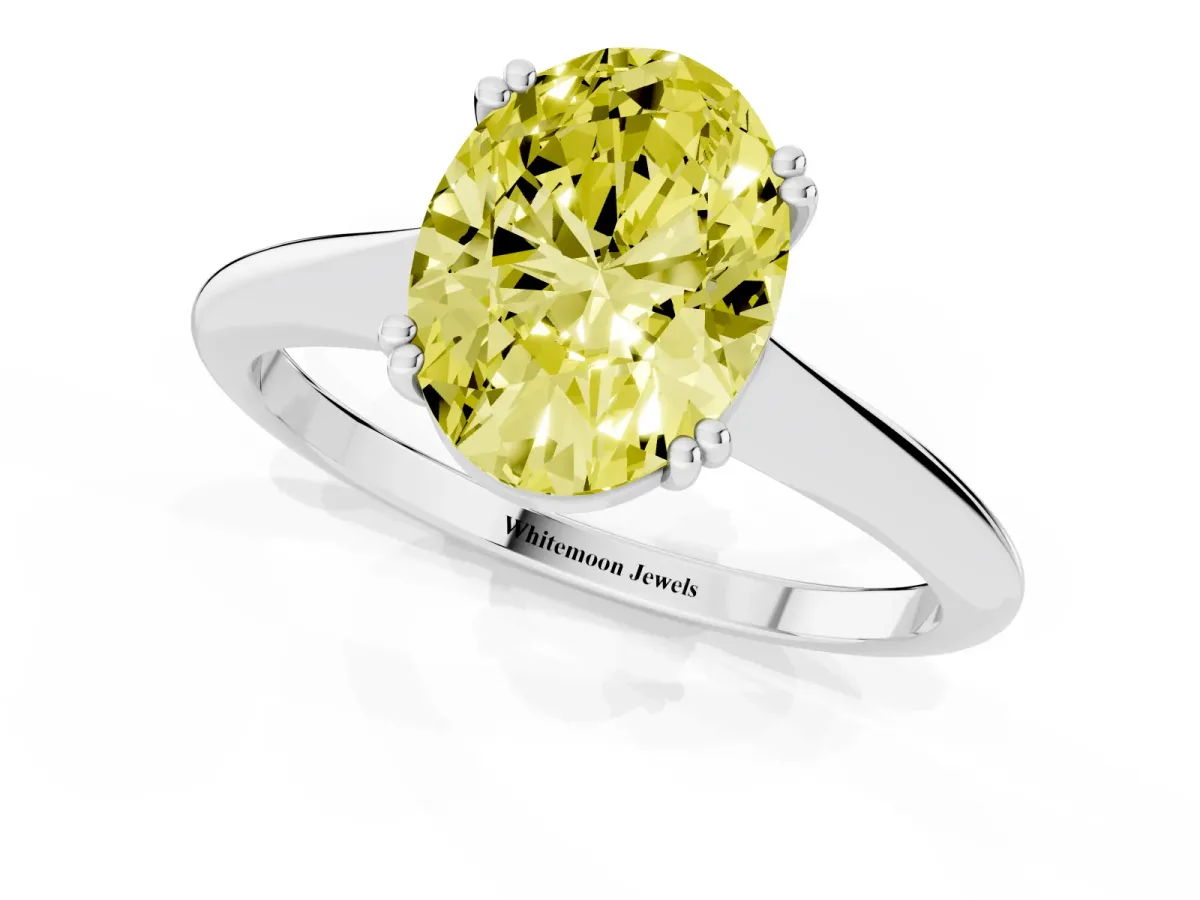 Fancy Yellow Oval Cut Solitaire Diamond Ring with Six-Prong Setting and Classic Band Silver