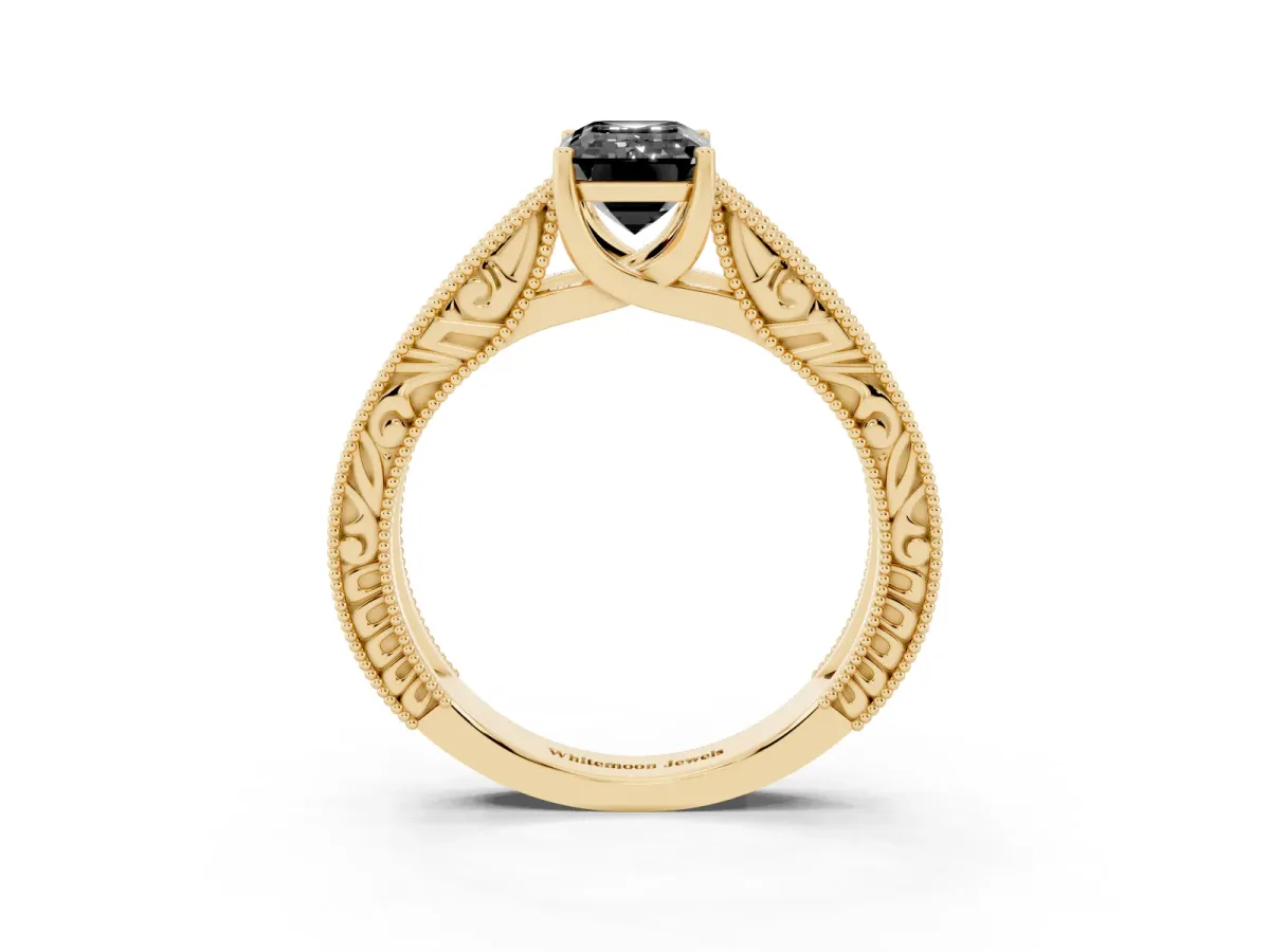 Fancy Black Emerald Cut Diamond Solitaire Ring with Engraved Band and Four-Prong Setting Yellow gold