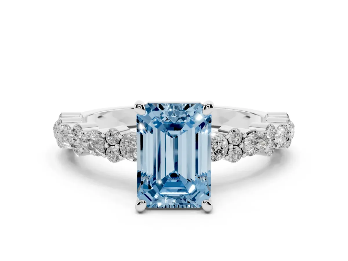 Fancy Blue Emerald Cut Diamond Side Stone Solitaire Ring with Round and Four-Prong Setting White gold