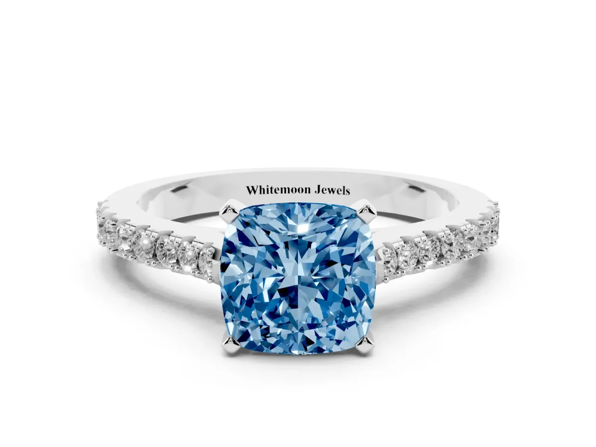 Fancy Blue Cushion Cut Cut Solitaire Diamond Engagement Ring with Pave Band and Four-Prong Setting Platinum