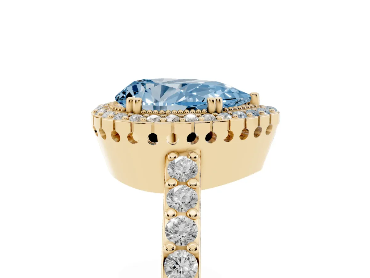 Fancy Blue Pear Cut Cut Diamond Halo Engagement Ring with Milgrain Detail and Pavé Band Yellow gold