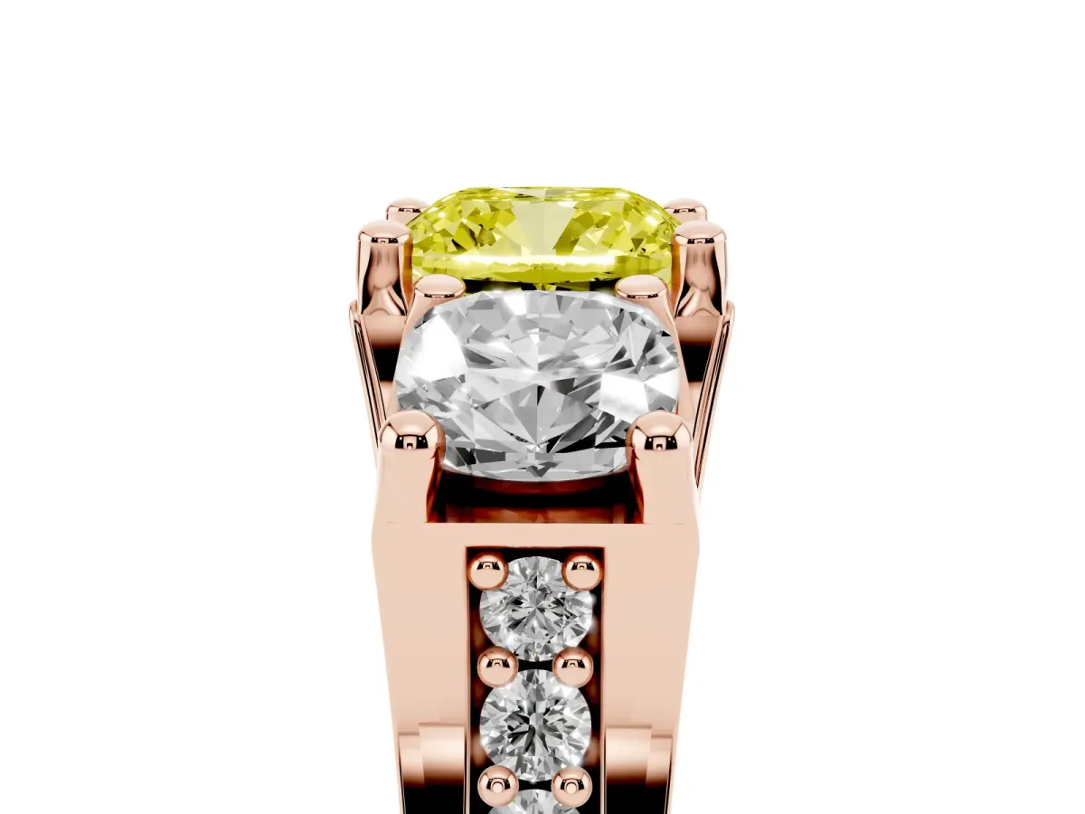Fancy Yellow Cushion Cut Diamond Three-Stone Ring with Channel Set Band and Four-Prong Setting Rose gold
