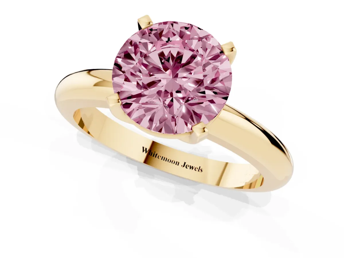 Fancy Pink Round Cut Diamond Solitaire Engagement Ring with Round Band and Four-Prong Setting Yellow gold