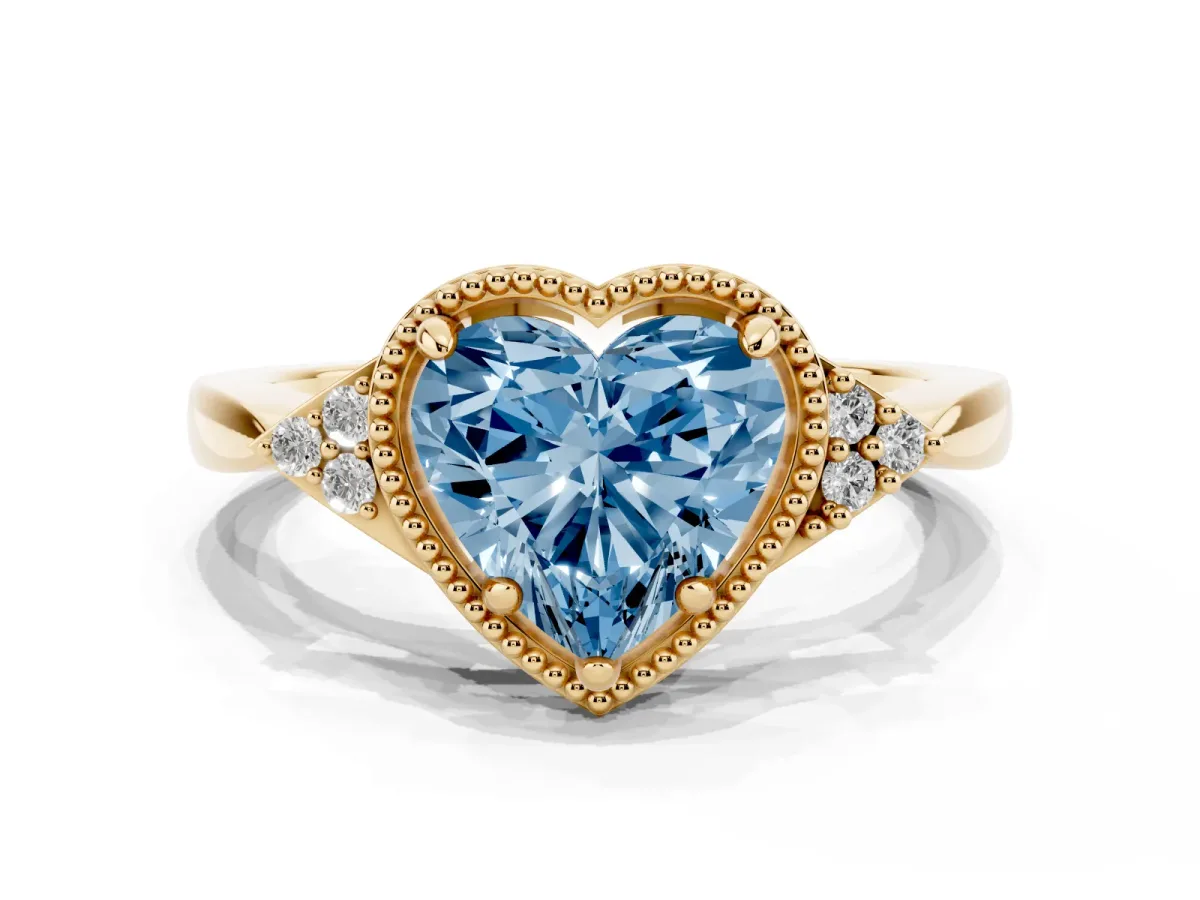 Fancy Blue Heart Cut Diamond Halo Ring with Tapered Band and Four-Prong Setting Yellow gold