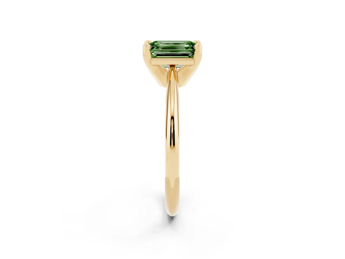 Fancy Green Emerald Cut Cut Solitaire Ring with Four-Prong Setting on a Classic Band Yellow gold