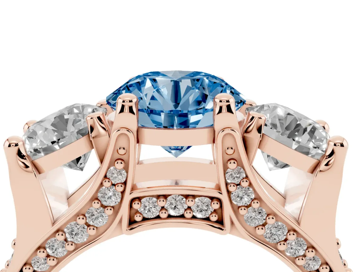 Fancy Blue Round Cut Diamond Three-Stone Ring with Channel Set Band and Four-Prong Setting Rose gold