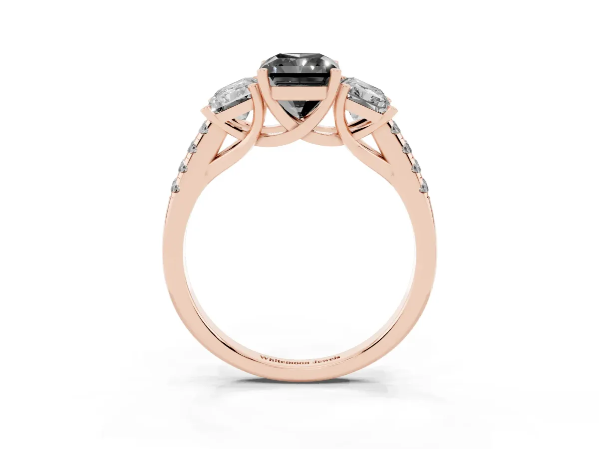 Fancy Black Three-Stone Radiant Cut Diamond Ring with Round Pavé Band and Prong Setting Rose gold