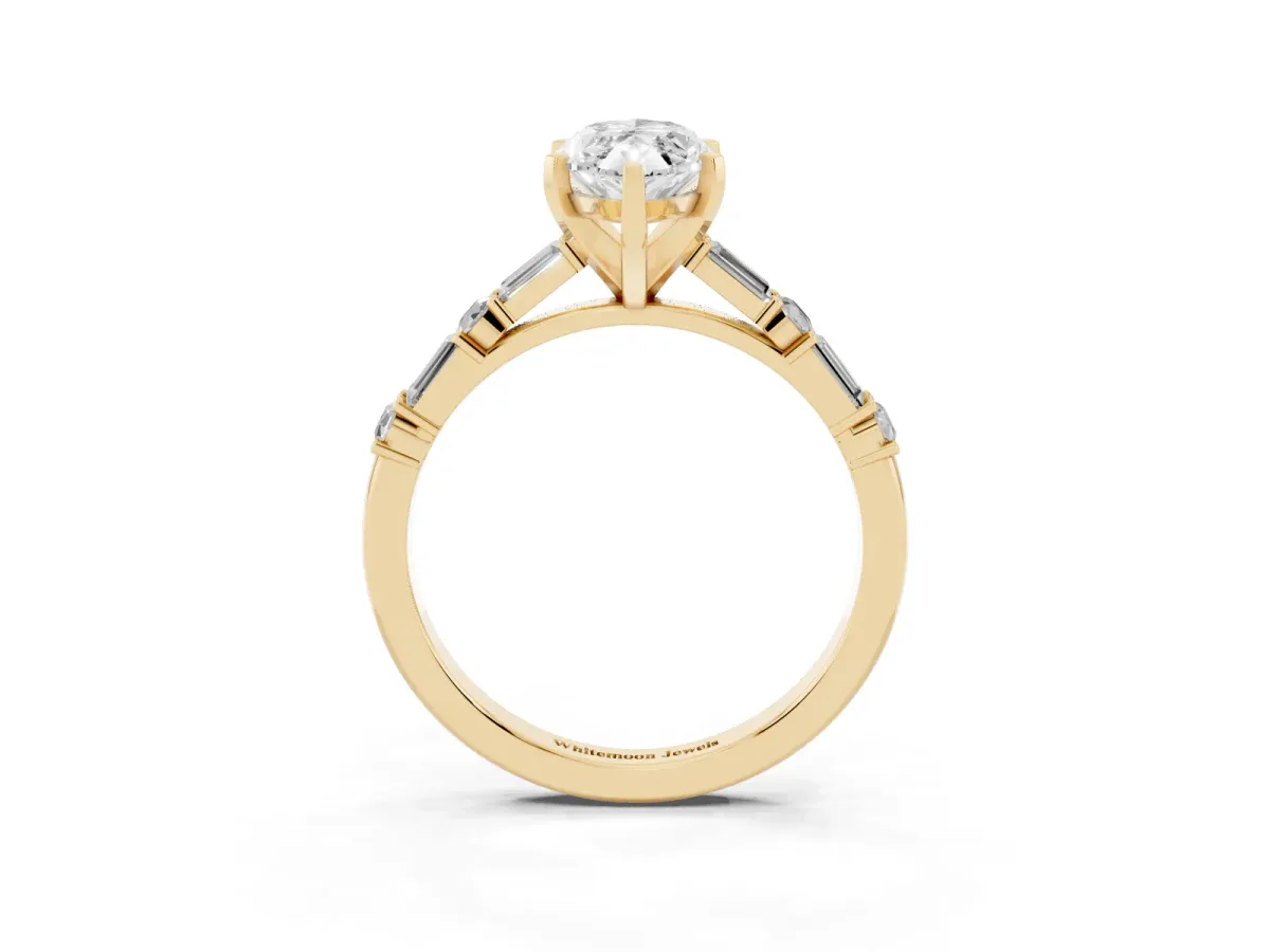 Marquise Cut Diamond Solitaire with Side Baguettes and Channel Set Band Yellow gold