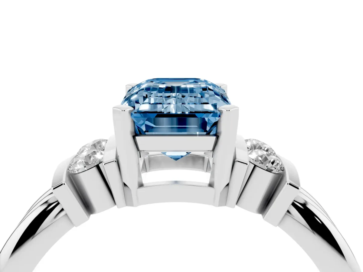Fancy Blue Emerald Cut Cut Three-Stone Channel Set Ring with Bar Prongs Platinum
