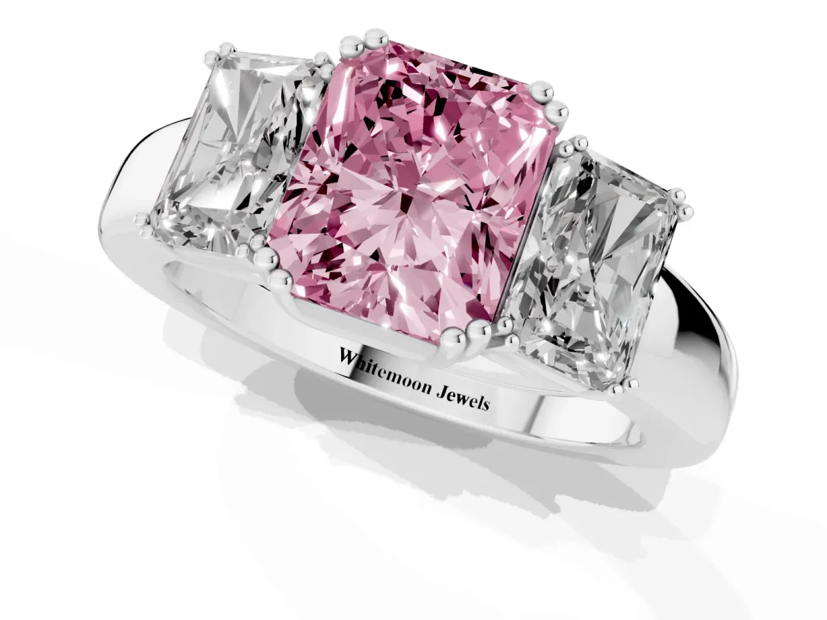 Fancy Pink Three-Stone Radiant Cut Cut Diamond Ring with Channel Set Band and Four-Prong Setting Platinum