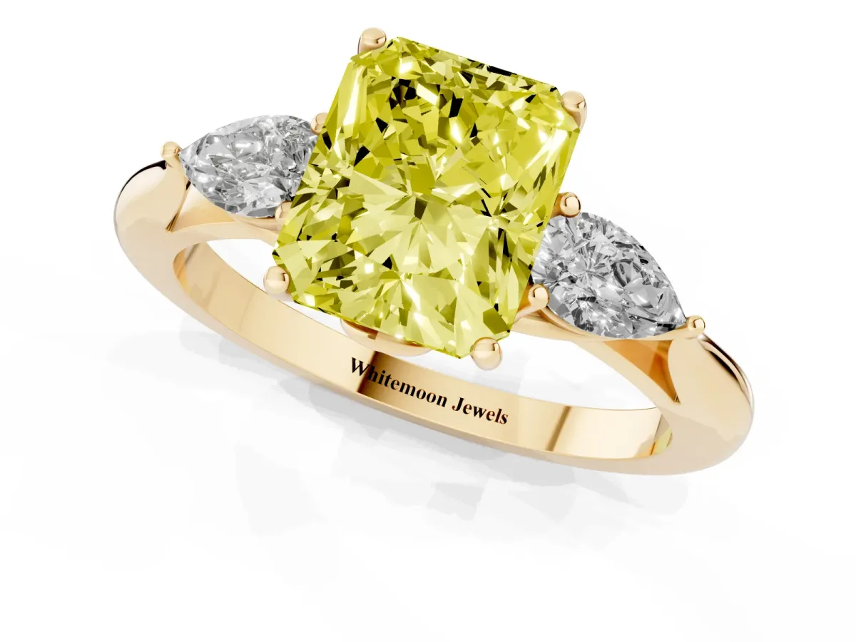 Fancy Yellow Radiant Cut Diamond Three-Stone Ring with Pear Side Stones and Prong Setting Yellow gold