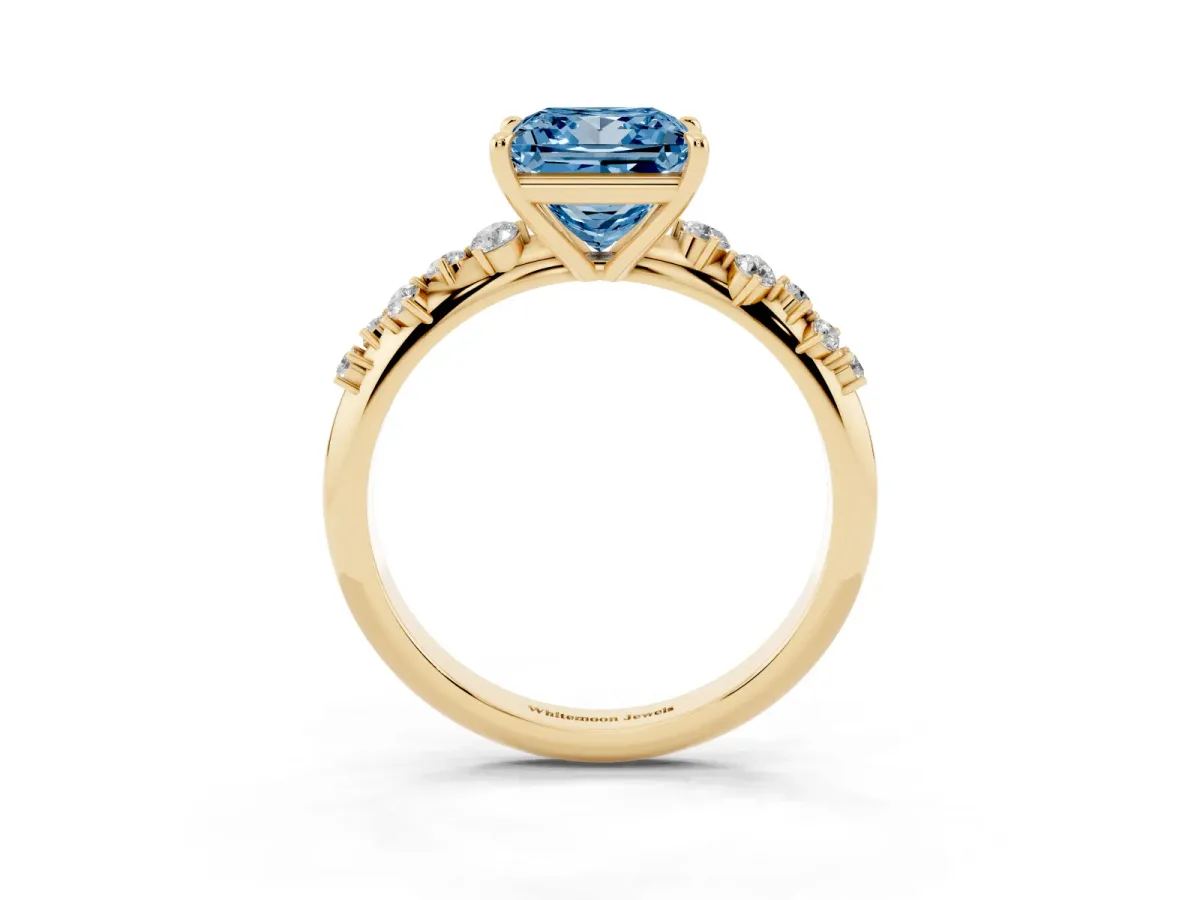 Fancy Blue Princess Cut Diamond Cluster Side Stone Solitaire Ring with Prong Setting Yellow gold