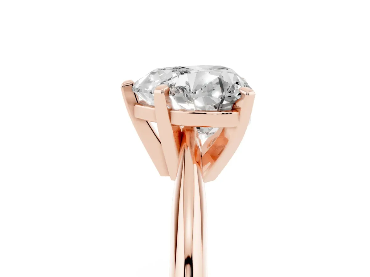 Heart Cut Cut Solitaire Ring with Four-Prong Setting on a Classic Band Rose gold
