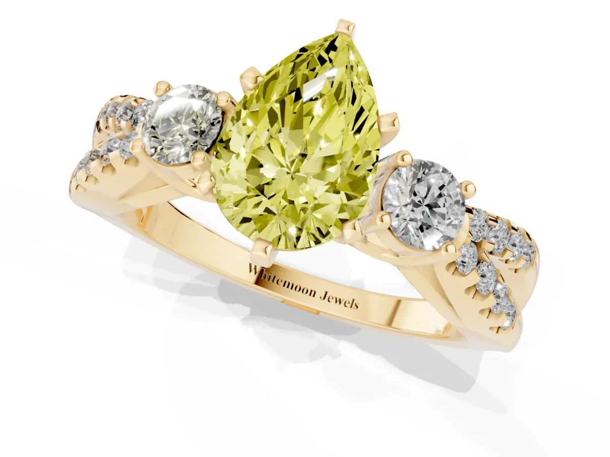 Fancy Yellow Pear Cut Diamond Three-Stone Ring with Pavé Split Shank and Four-Prong Setting Yellow gold