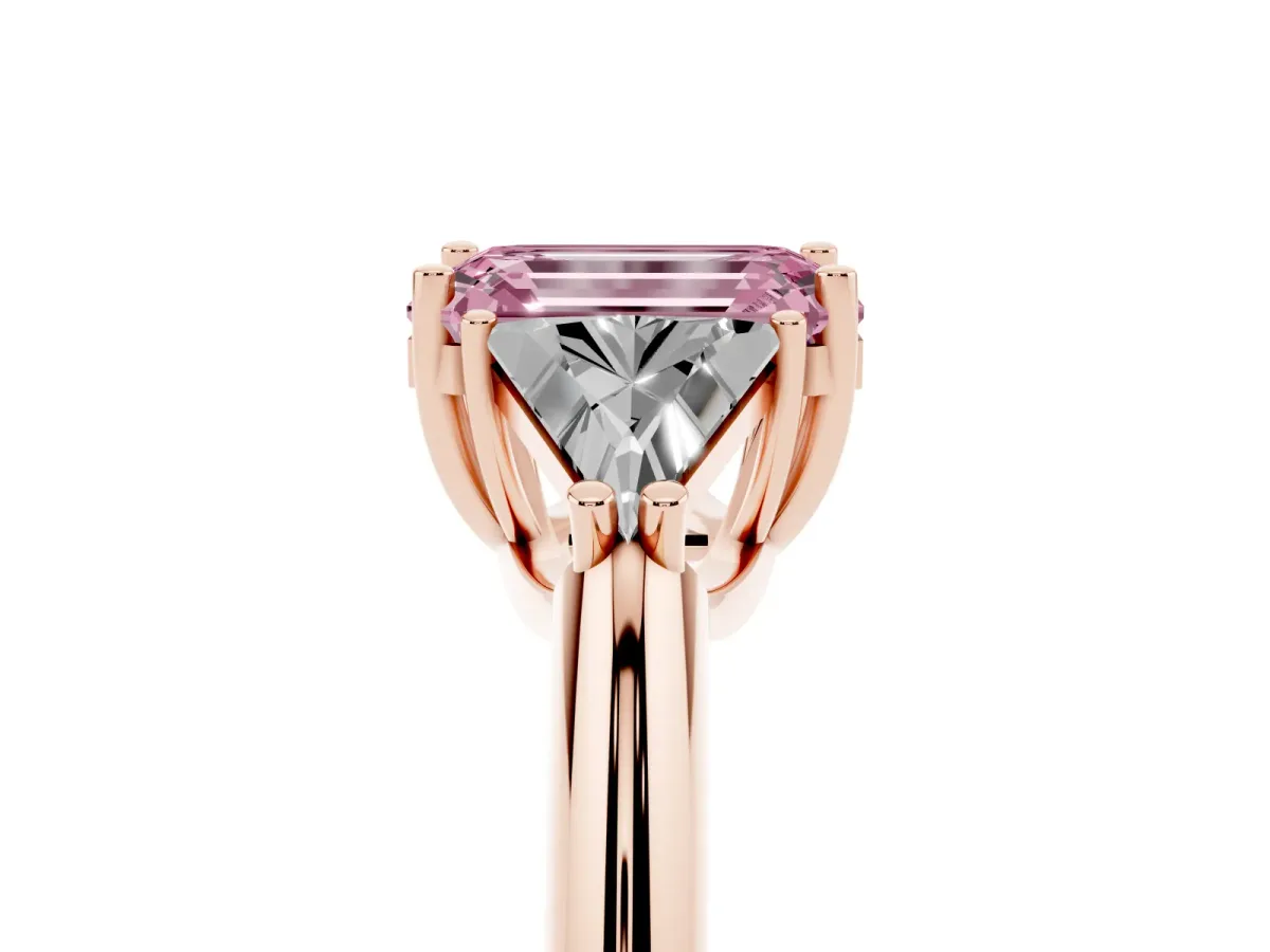 Fancy Pink Three-Stone Emerald Cut Diamond Engagement Ring with Trillion Side Stones and Prong Setting Rose gold