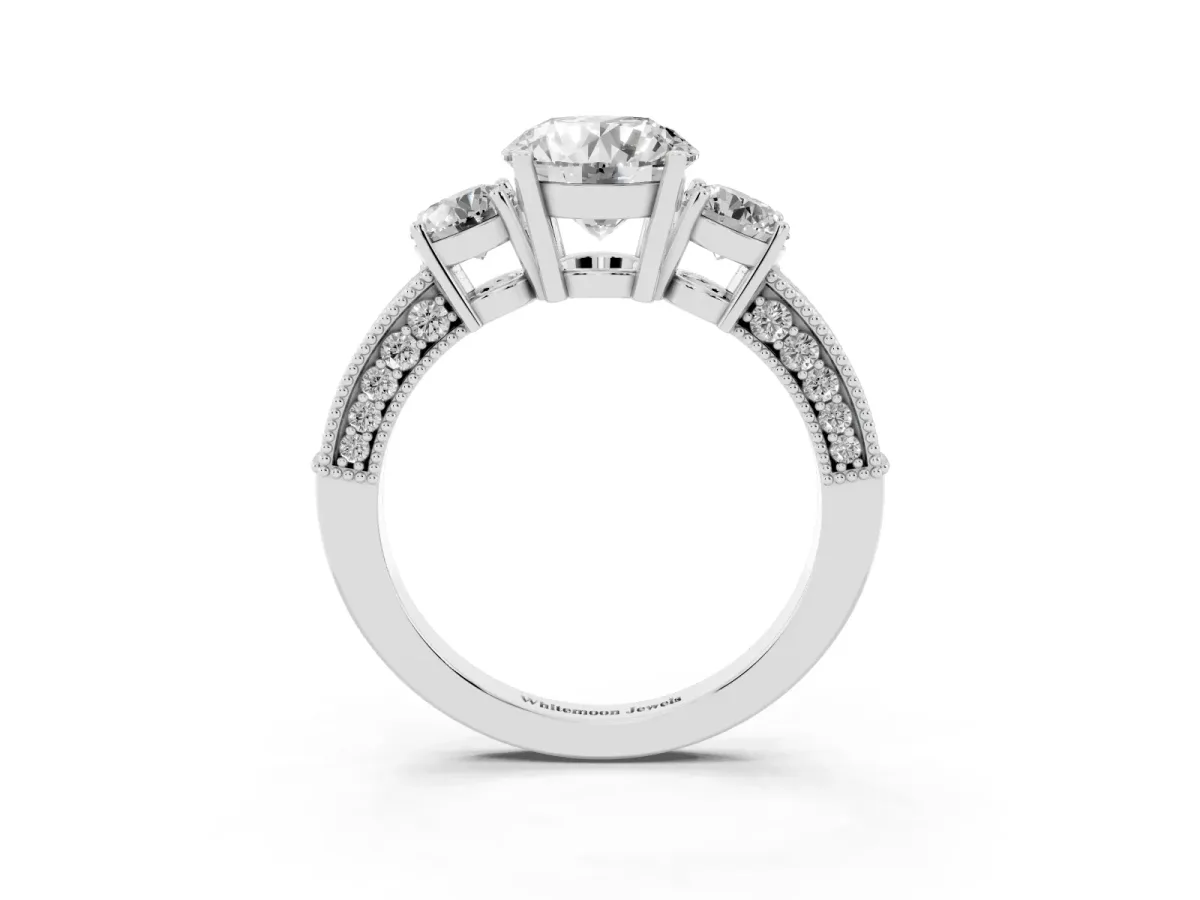 Round Cut Three-Stone Diamond Ring with Pavé Band and Four-Prong Setting Silver