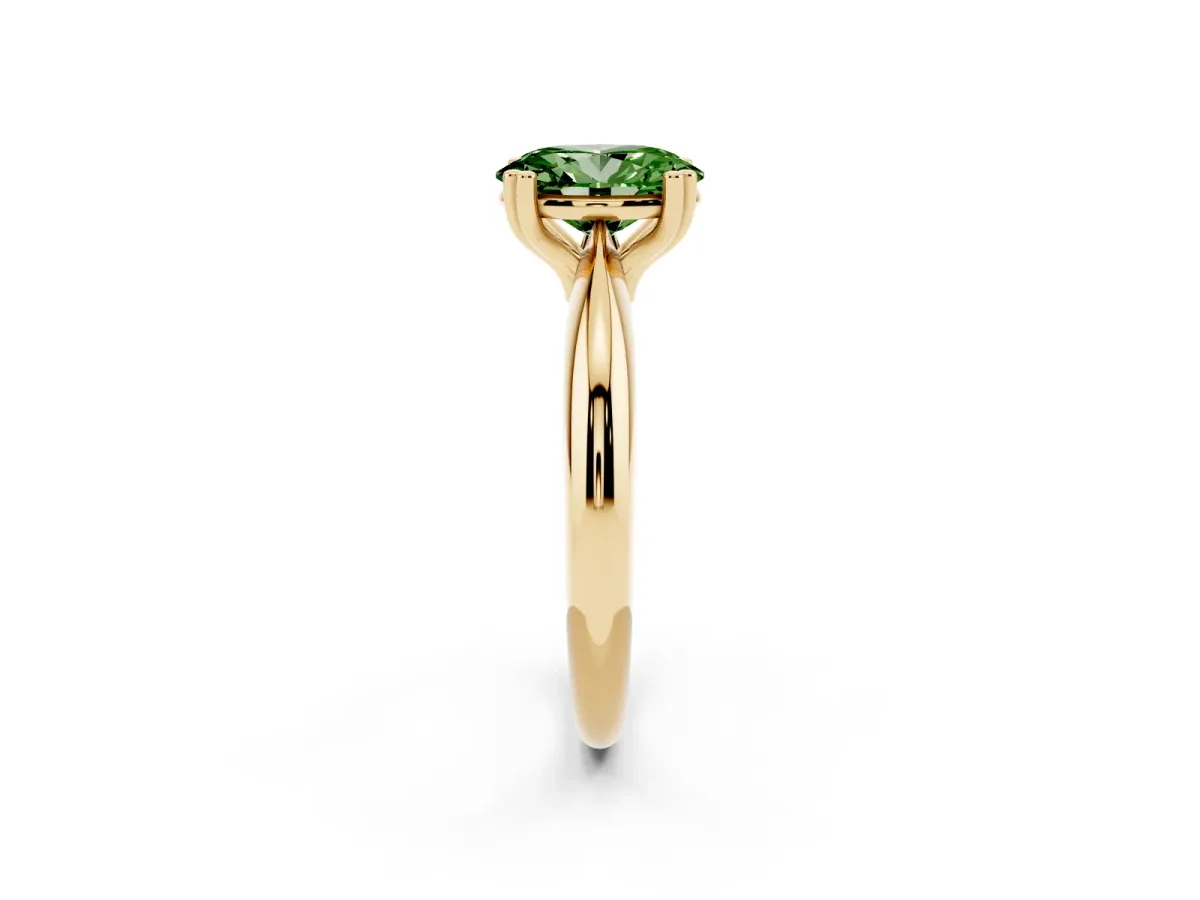 Fancy Green Oval Cut Cut Solitaire Engagement Ring with Tapered Band and Four-Prong Setting Yellow gold