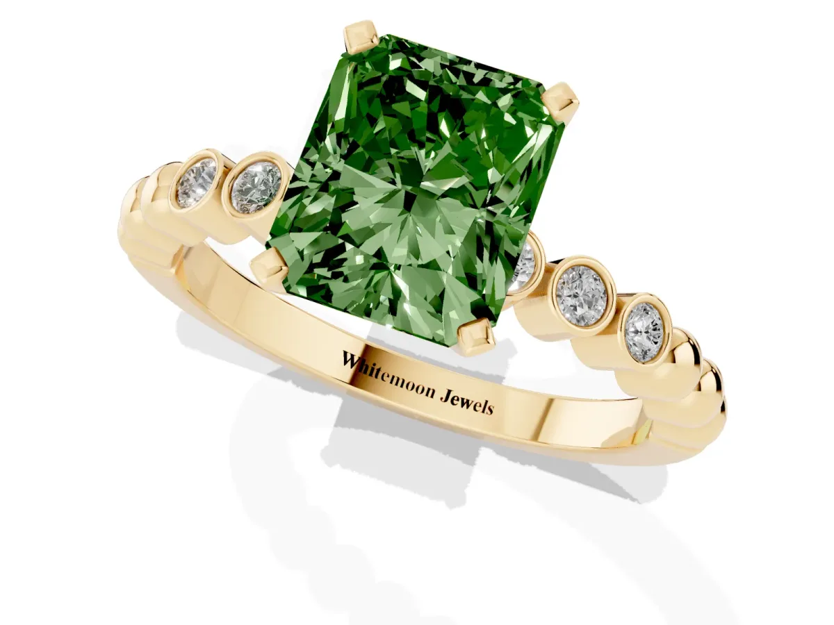 Fancy Green Radiant Cut Solitaire Bezel Accent Diamond Engagement Ring with Beaded Band and Four-Prong Setting Yellow gold