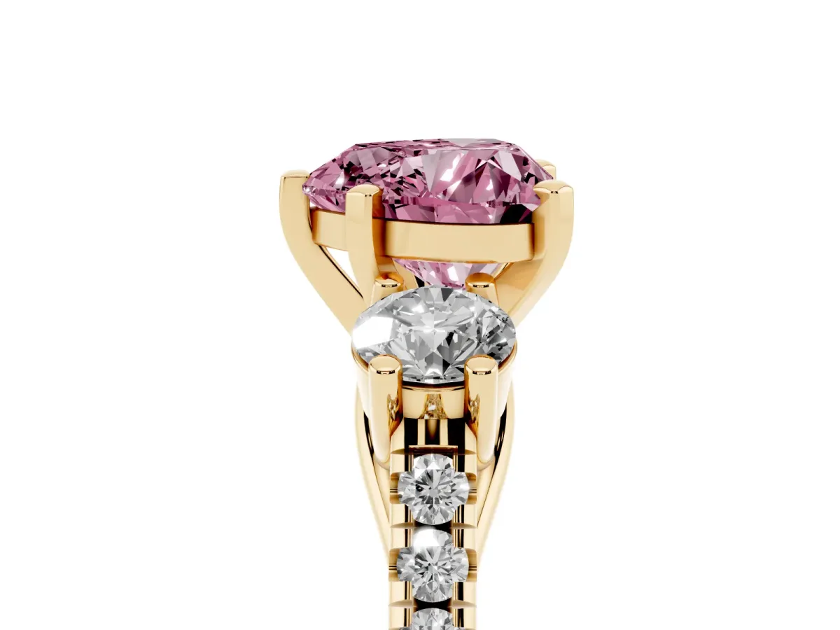 Fancy Pink Three-Stone Heart Cut Diamond Pavé Band with Four-Prong Setting Yellow gold