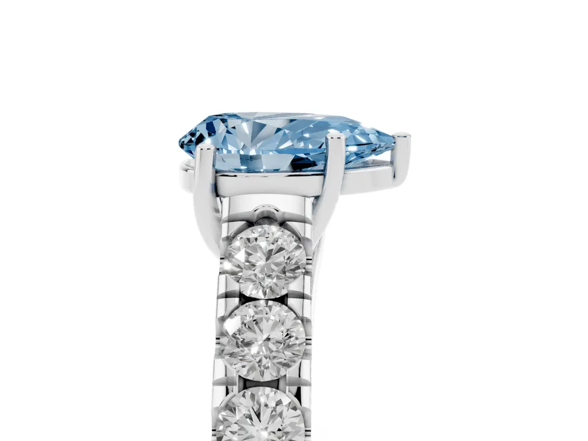 Fancy Blue Pear Cut Cut Diamond Solitaire Ring with Micro Pave Band and Prong Setting Silver