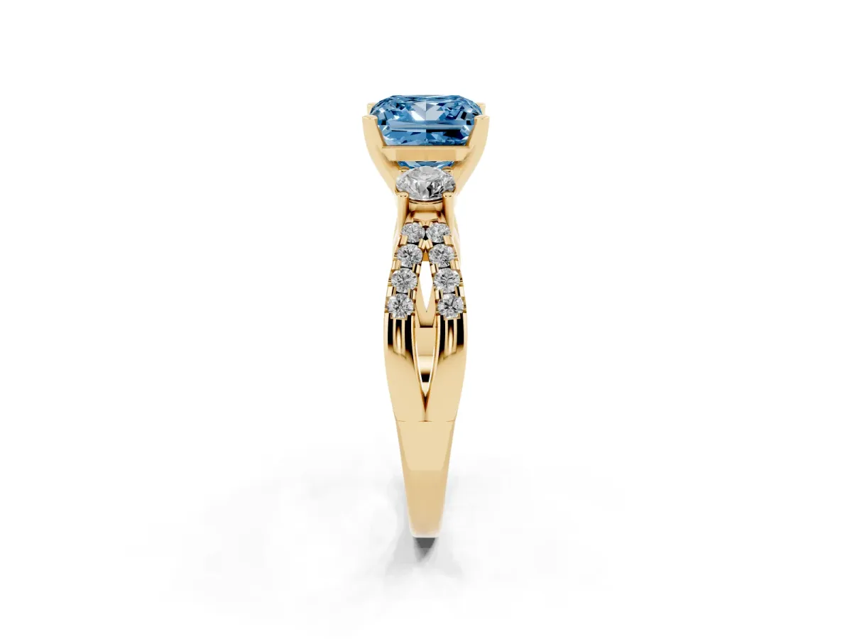 Fancy Blue Princess Cut Diamond Three-Stone Ring with Pavé Split Shank and Four-Prong Setting Yellow gold