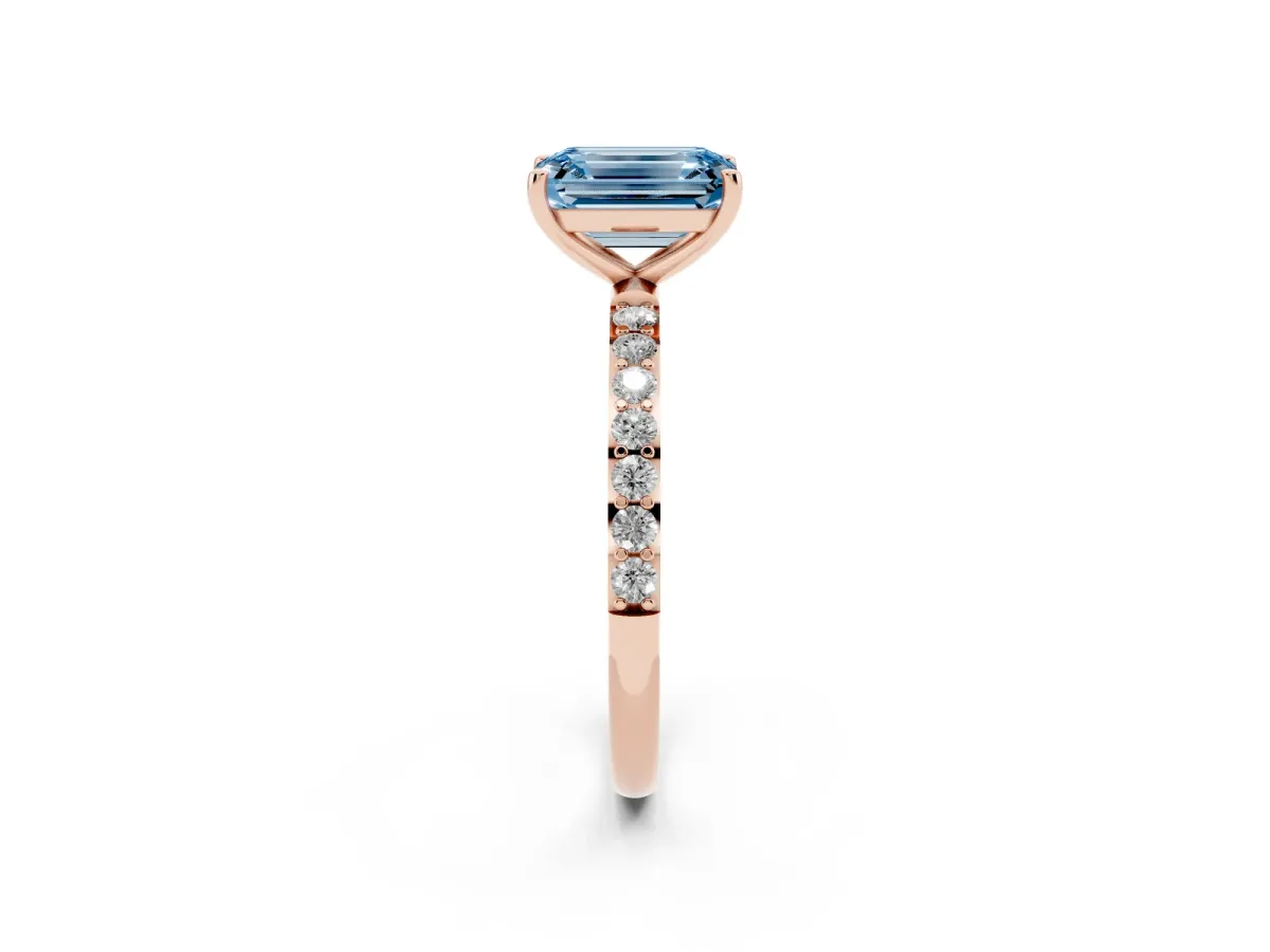 Fancy Blue Emerald Cut Diamond Solitaire Ring with Round Pavé Shoulders and Prong Setting Rose gold