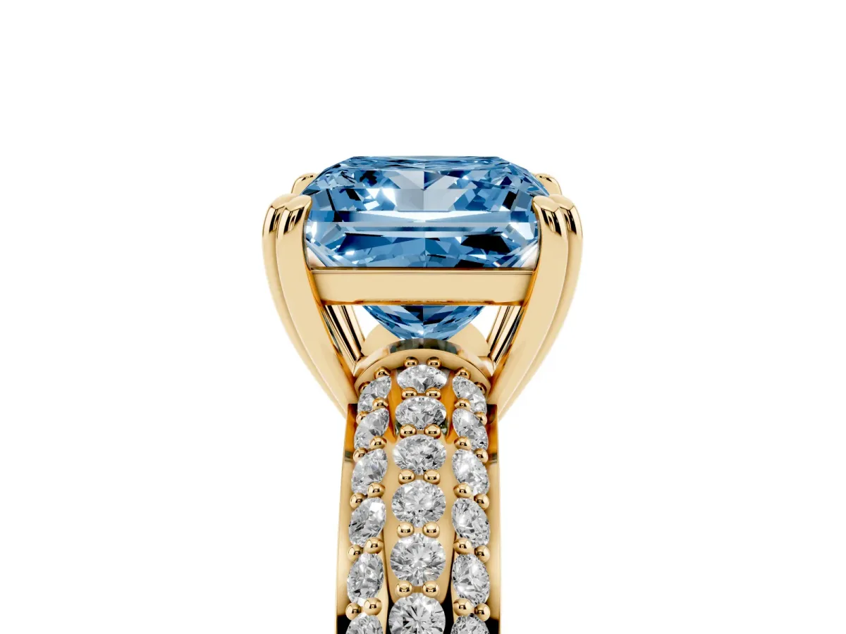Fancy Blue Princess Cut Diamond Solitaire Ring with Multi-Row Round Pavé Band and Prong Setting Yellow gold