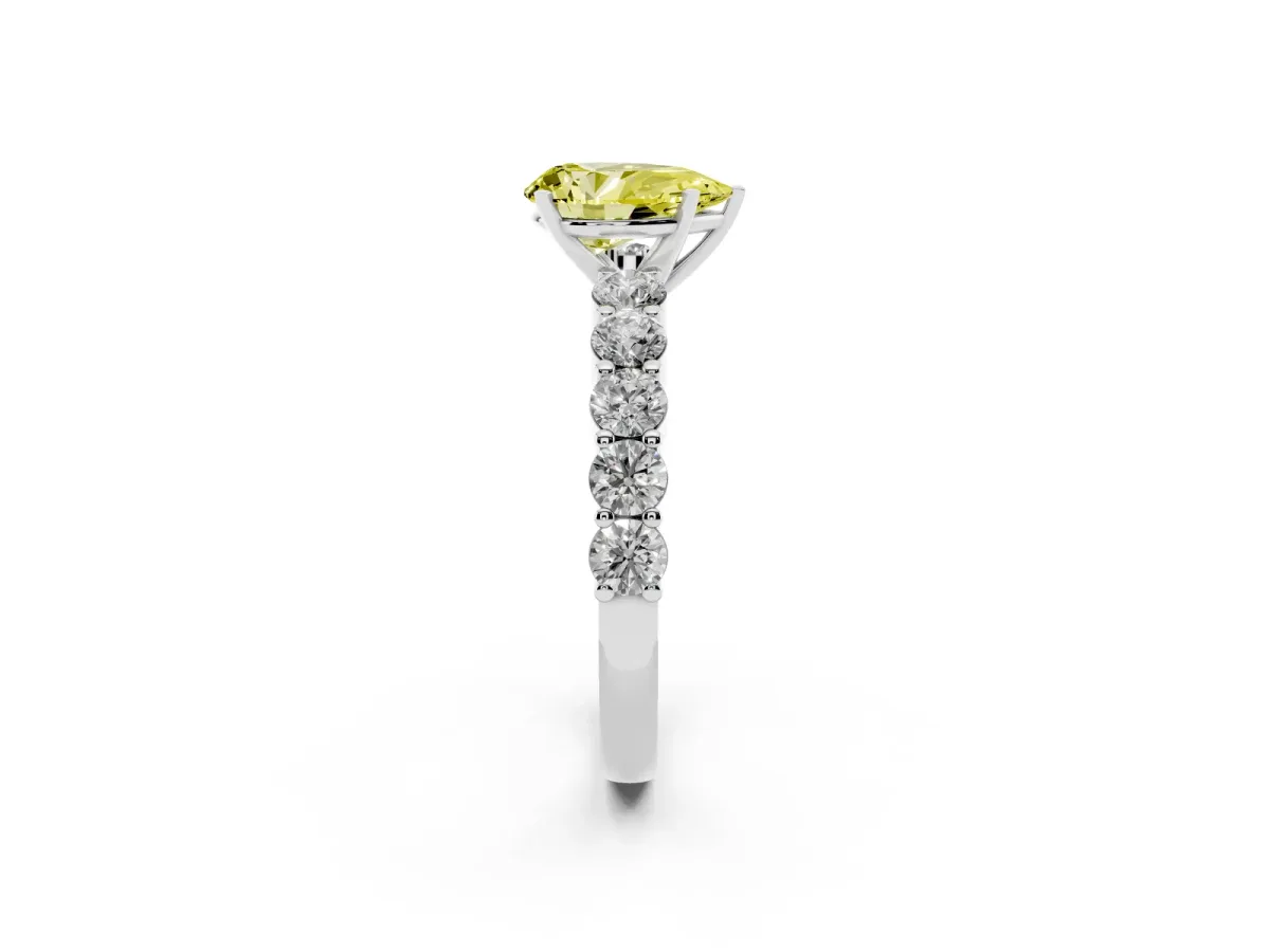 Fancy Yellow Pear Cut Diamond Solitaire Ring with Shared Prong Round Side Stones Silver