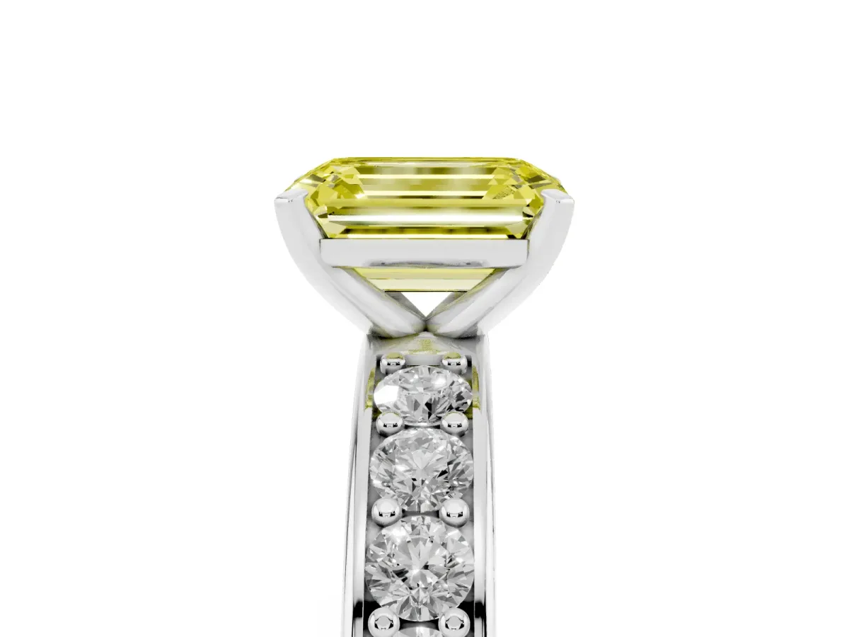Fancy Yellow Emerald Cut Diamond Engagement Ring with Channel Set Round Band and Prong Setting Platinum
