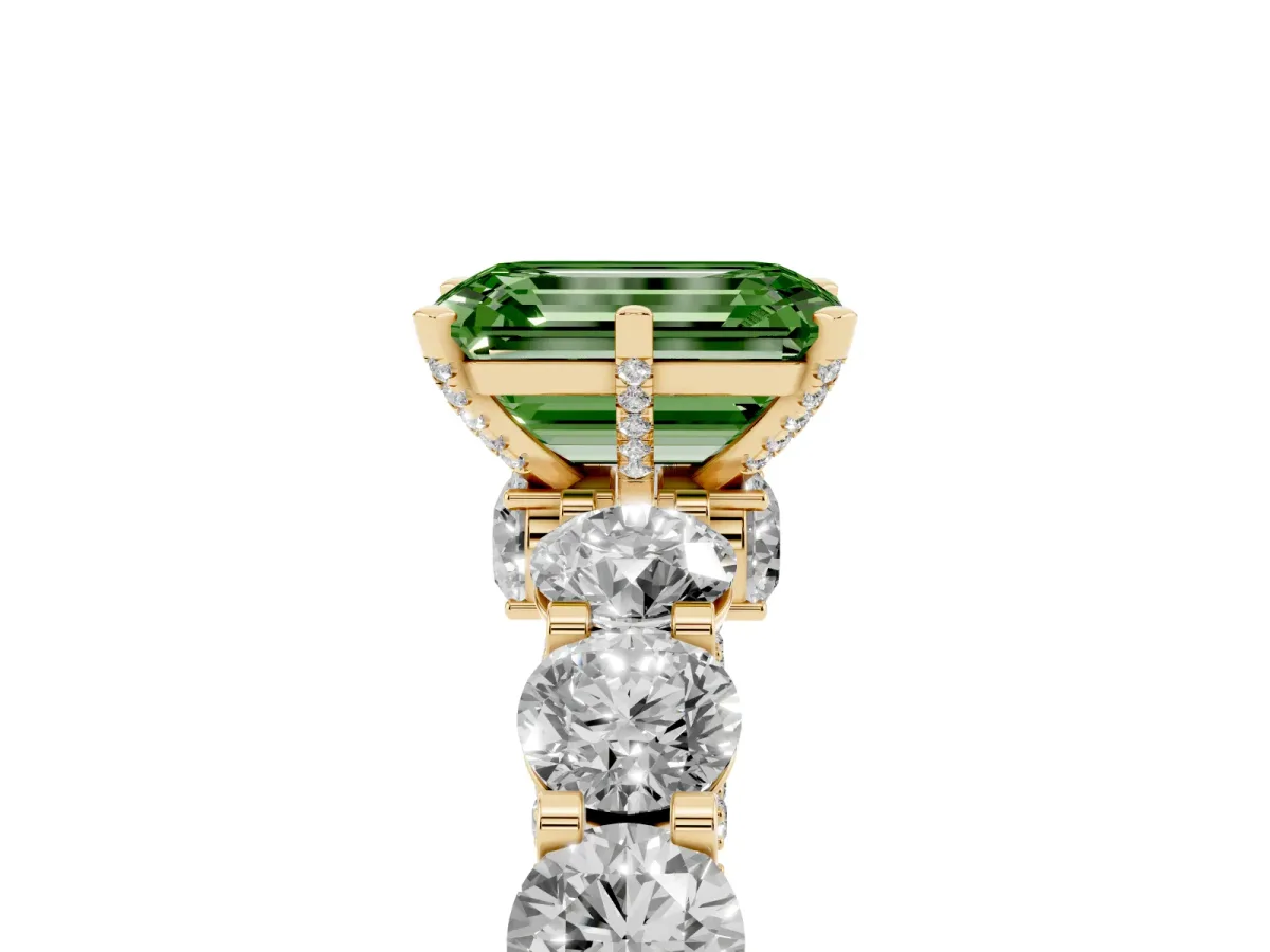 Fancy Green Emerald Cut Diamond Side Stone Engagement Ring with Four-Prong Setting Yellow gold