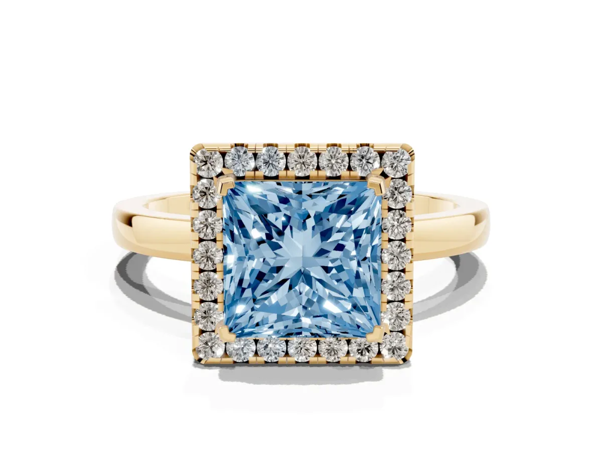 Fancy Blue Princess Cut Halo Diamond Solitaire with Pavé Band and Four-Prong Setting Yellow gold