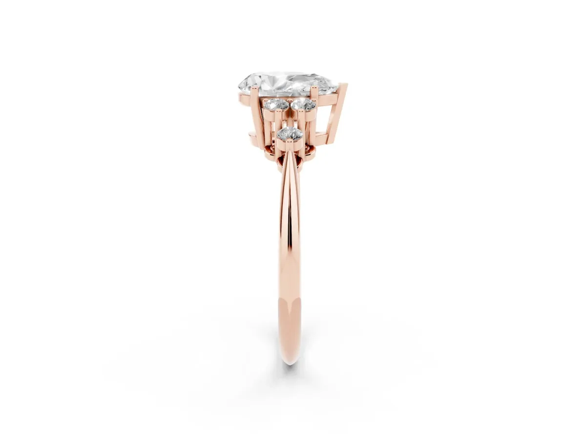 Pear Cut Cut Diamond Cluster Ring with Solitaire Band and Four-Prong Setting Rose gold