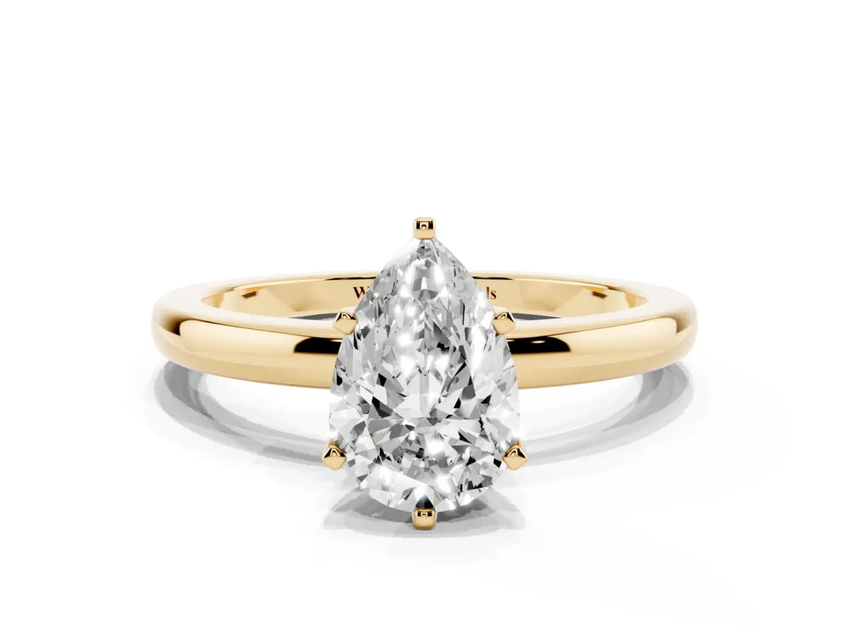 Pear Cut Solitaire Diamond Ring with Six-Prong Setting on a Classic Band Yellow gold