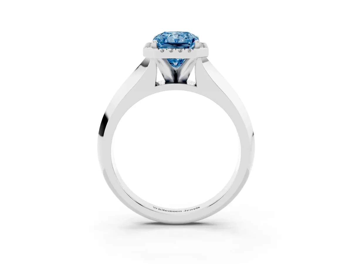 Fancy Blue Radiant Cut Halo Diamond Ring with Cathedral Band and Four-Prong Setting White gold