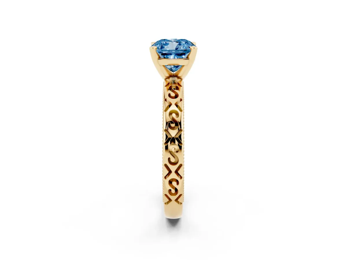 Fancy Blue Cushion Cut Solitaire Engagement Ring with Scrollwork Band and Four-Prong Setting Yellow gold
