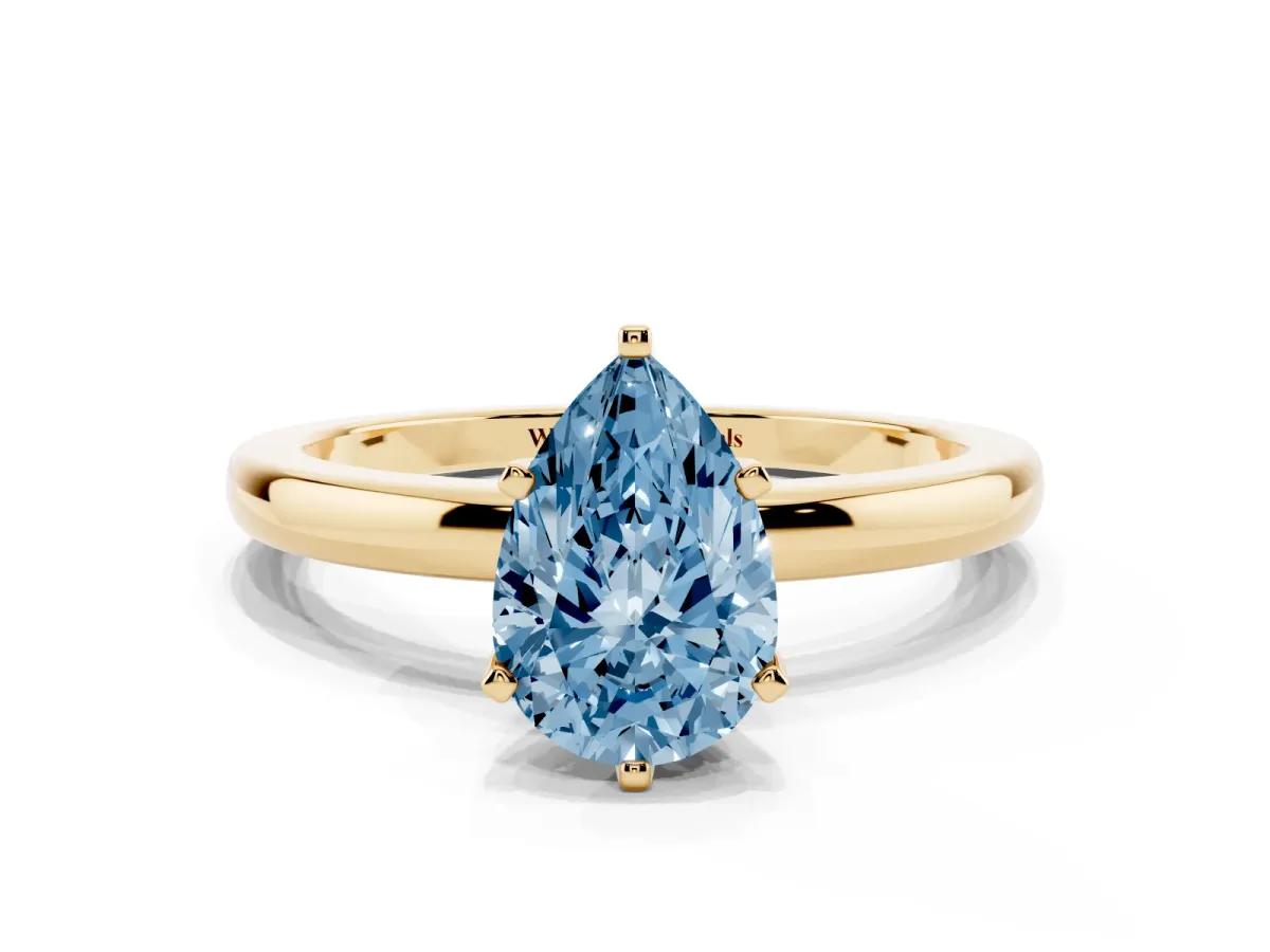 Fancy Blue Pear Cut Solitaire Diamond Ring with Six-Prong Setting on a Classic Band Yellow gold