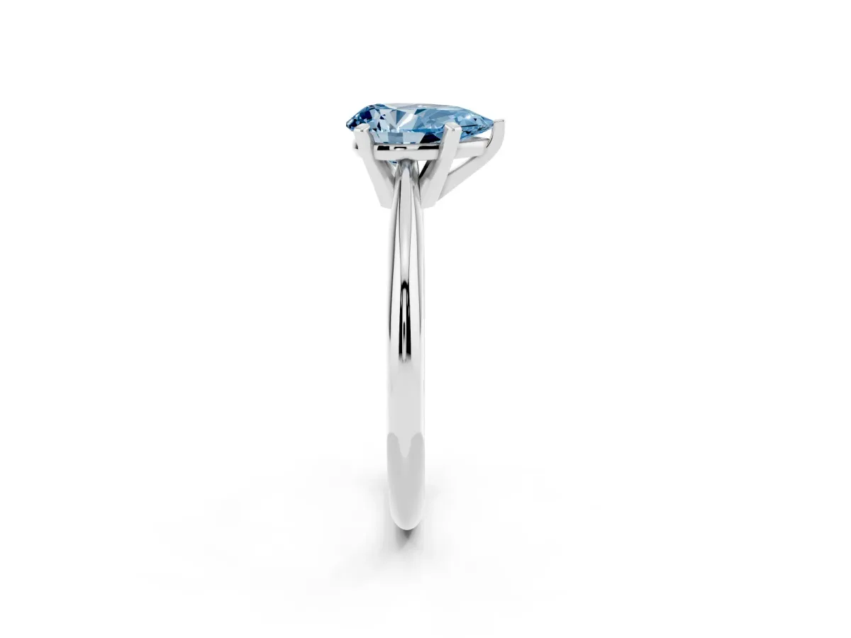 Fancy Blue Pear Cut Cut Solitaire Ring with Four-Prong Setting on a Classic Band Silver