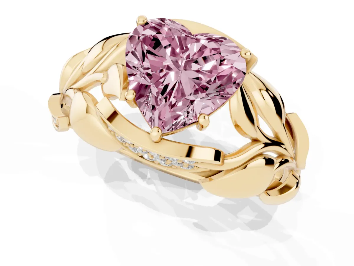 Fancy Pink Heart Cut Diamond Leaf-Inspired Engagement Ring with Round Accents and Prong Setting Yellow gold