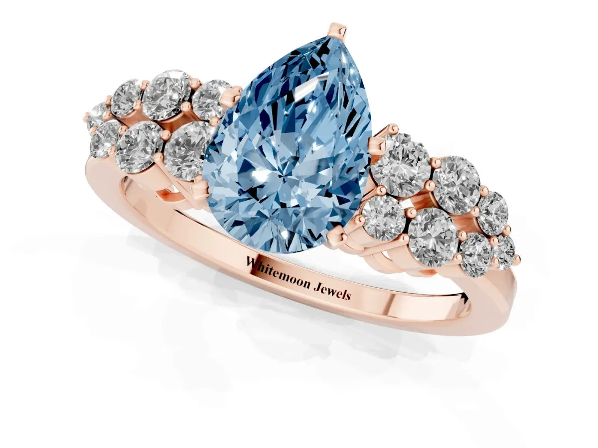 Fancy Blue Pear Cut Cluster Diamond Engagement Ring with Pavé Band and Four-Prong Setting Rose gold
