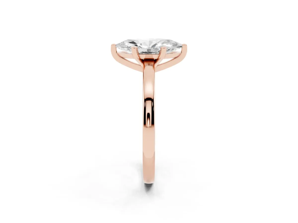 Marquise Cut Solitaire Diamond Engagement Ring with Four-Prong Setting on a Classic Band Rose gold