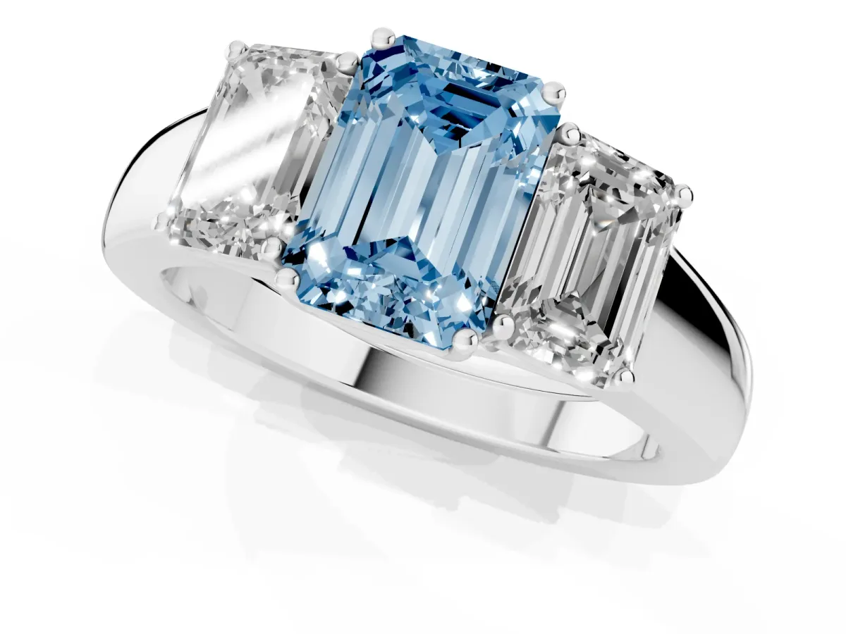 Fancy Blue Three-Stone Emerald Cut Cut Diamond Ring with Prong Setting and Classic Band Silver
