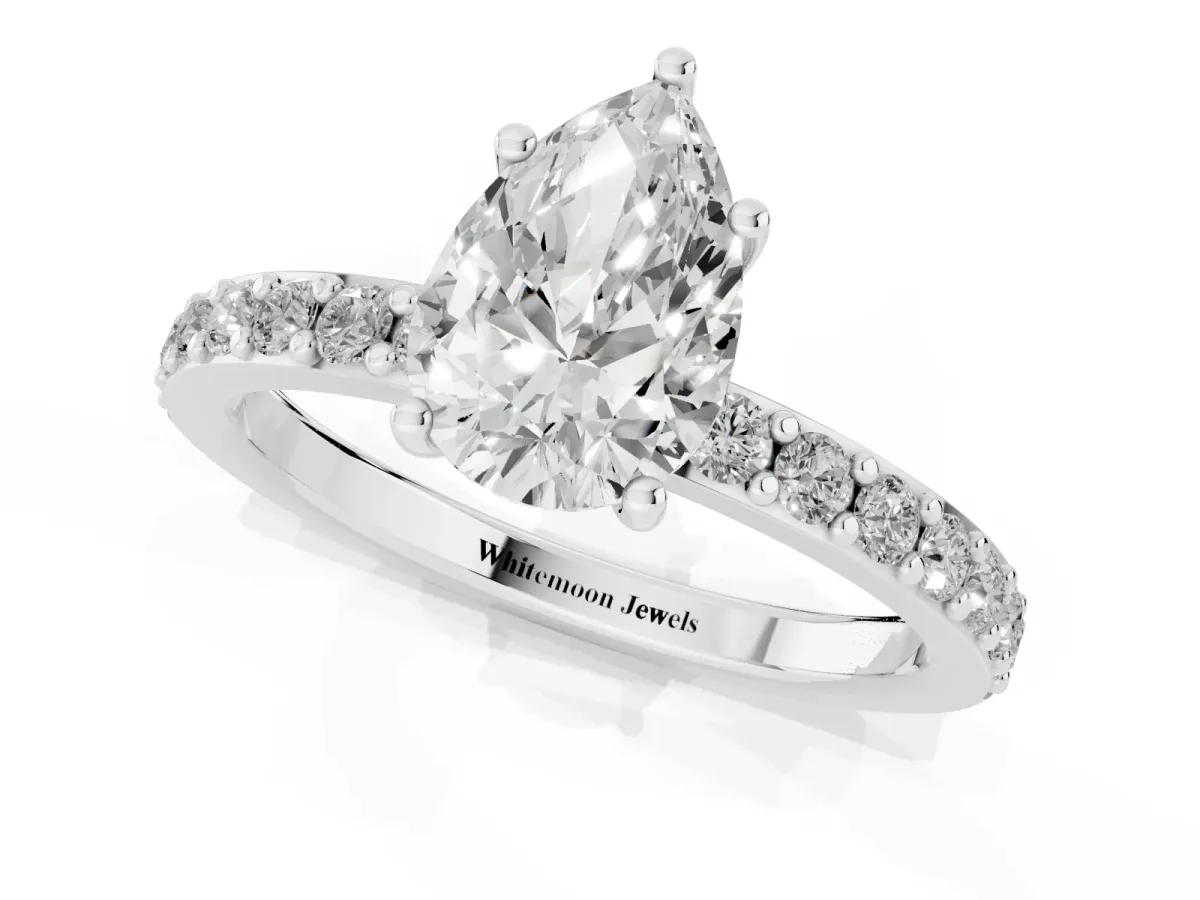 Pear Cut Cut Diamond Solitaire with Pave Band and Four-Prong Setting Silver