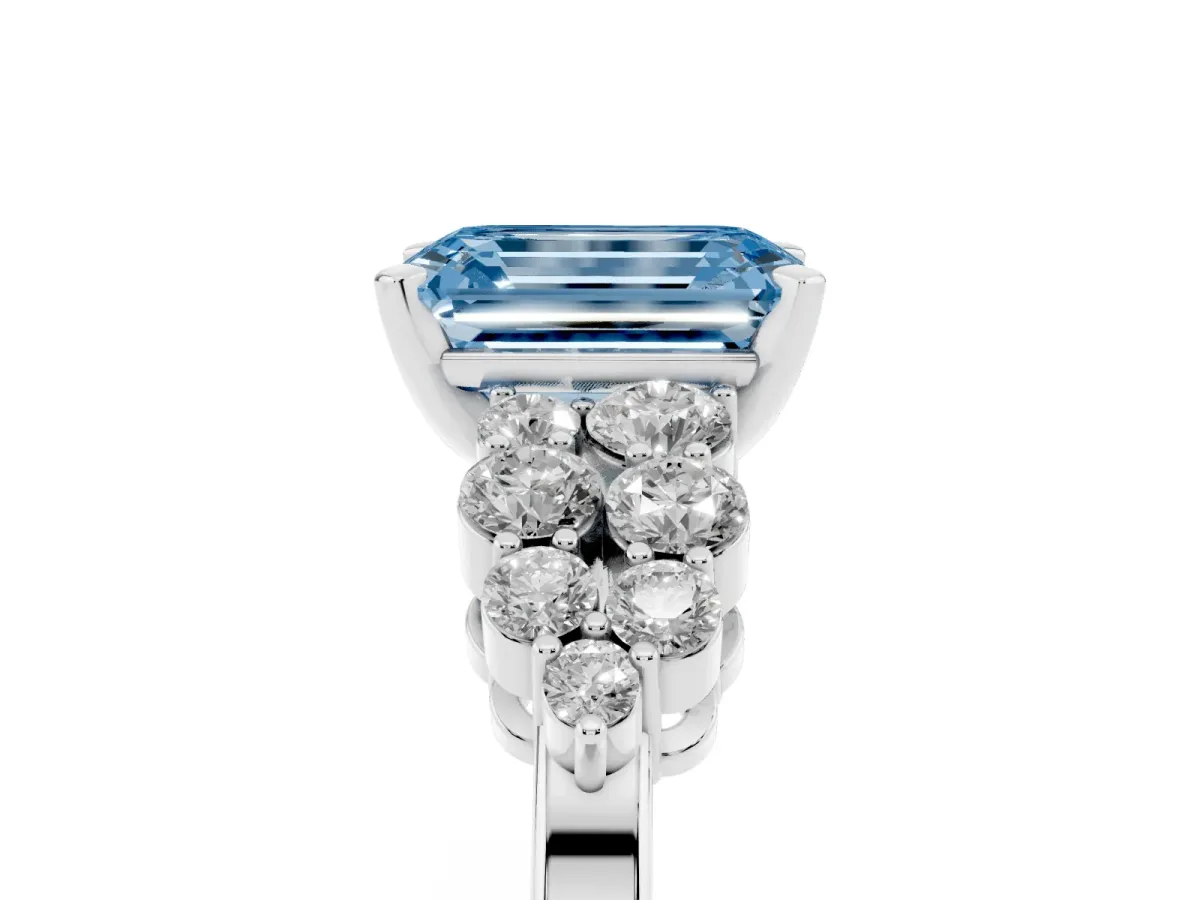 Fancy Blue Emerald Cut Cluster Diamond Engagement Ring with Pavé Band and Four-Prong Setting Silver
