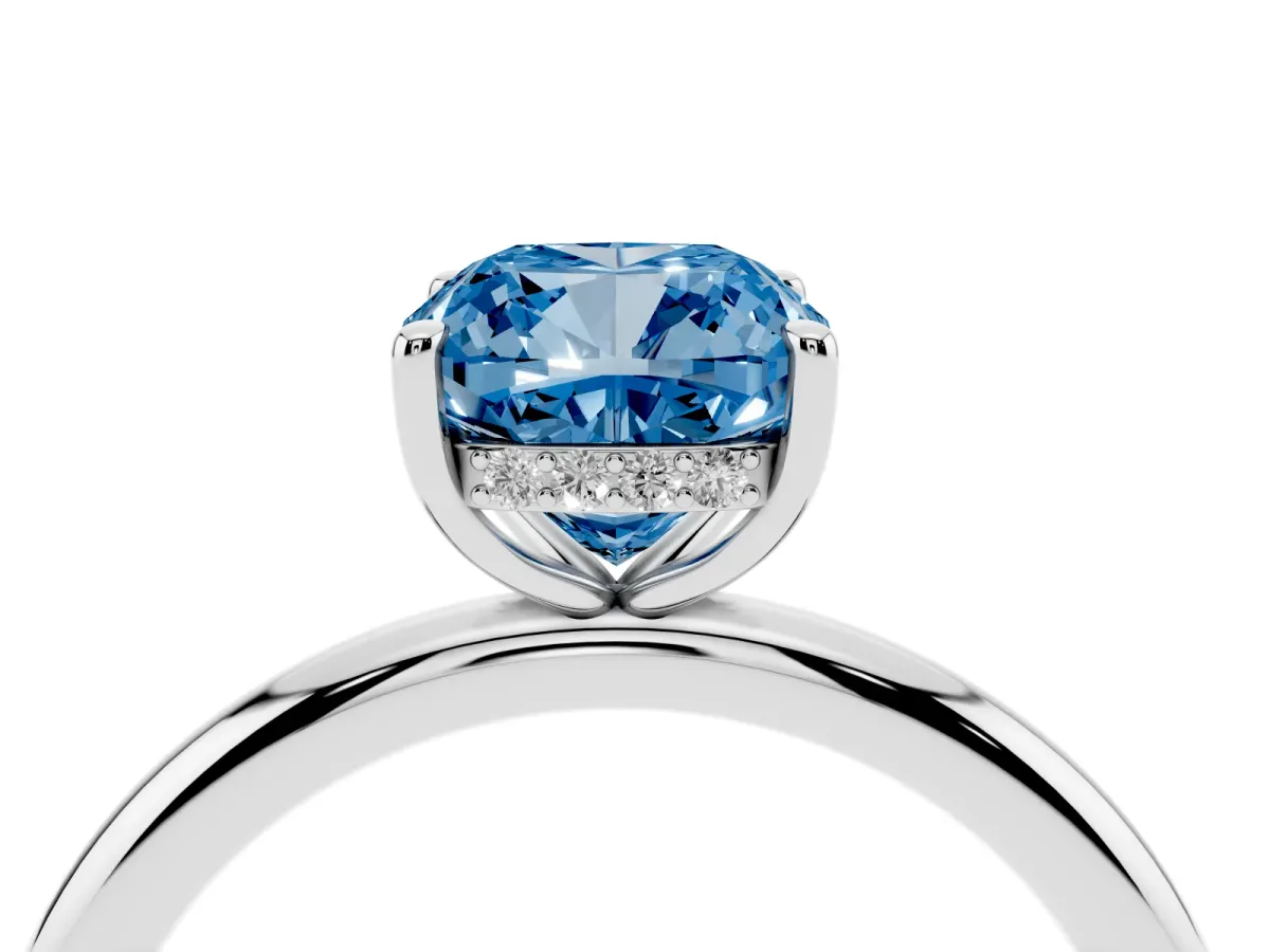 Fancy Blue Cushion Cut Diamond Solitaire Ring with Thin Band and Four-Prong Setting Platinum